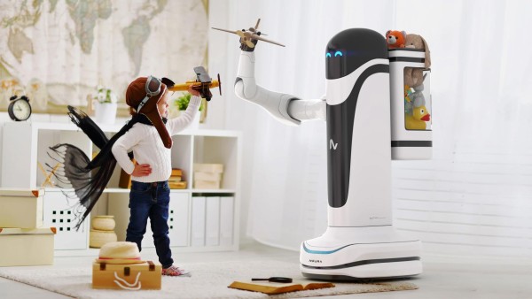 A Child standing in front of a roboter of Neura